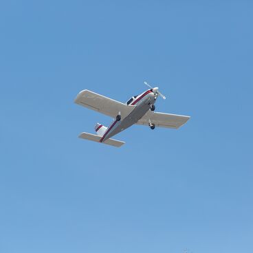 White Plane Flying Overhead at Santa Monica Airport